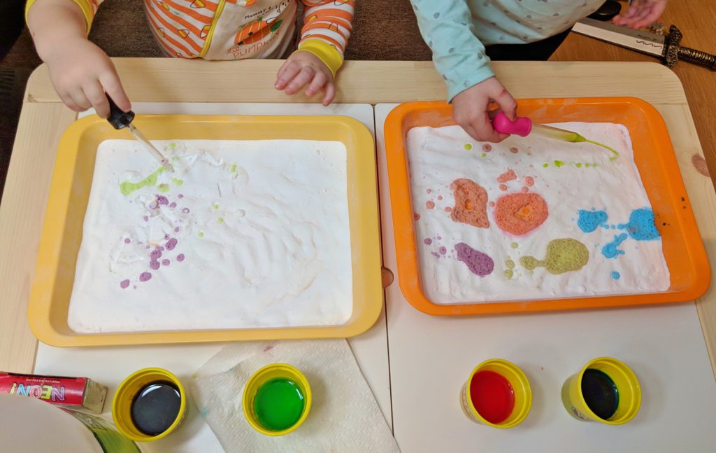 colourful fizzing baking soda and vinegar science experiment